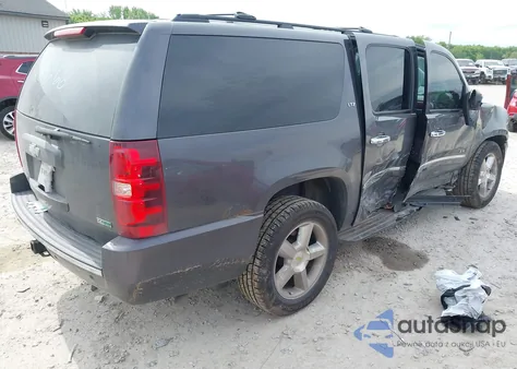 2010 Chevrolet Suburban 1500 Ltz z USA, uszkodzony, nr VIN 1GNUKKE33AR287266